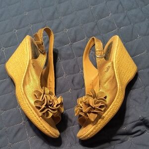 Bolo Gold Wedge Sandals with Floral Accent